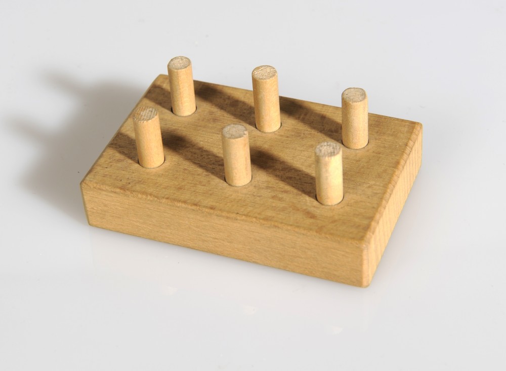 Pièce en bois pour apprendre les lettres Braille