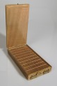 Boîte en bois pour apprendre le Braille